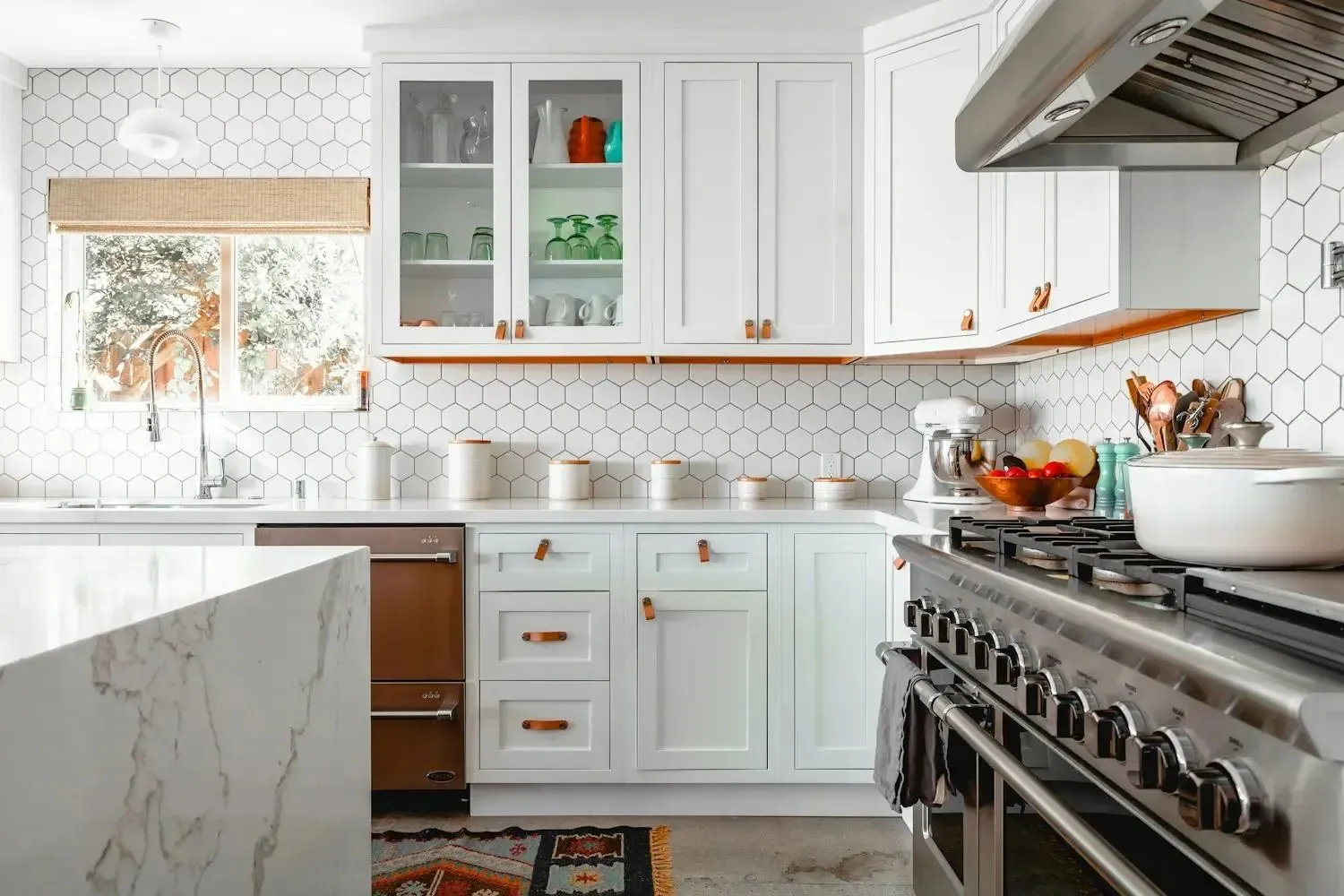 Bright renovated kitchen with white cabinets