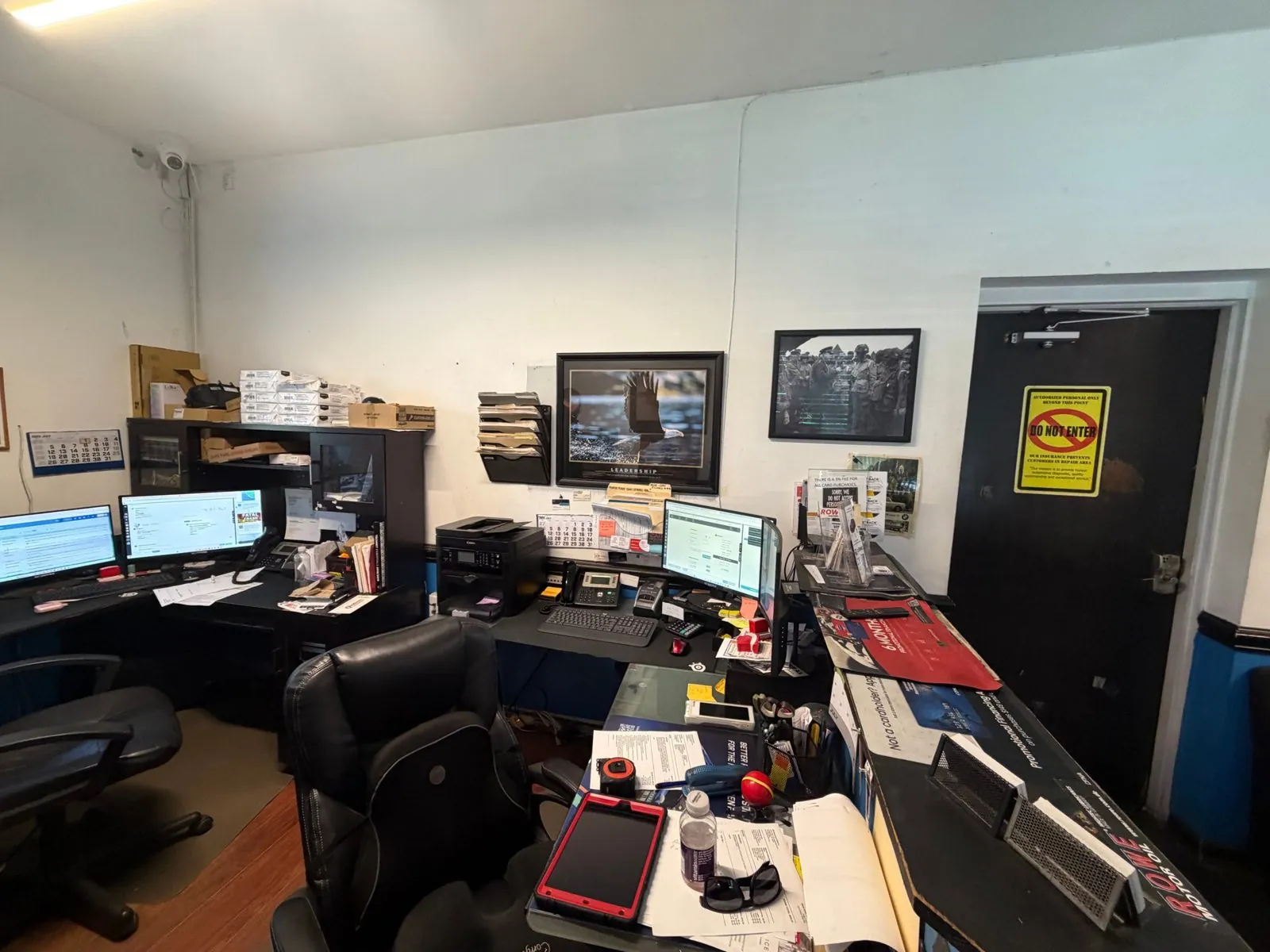 Cluttered front desk area before renovation