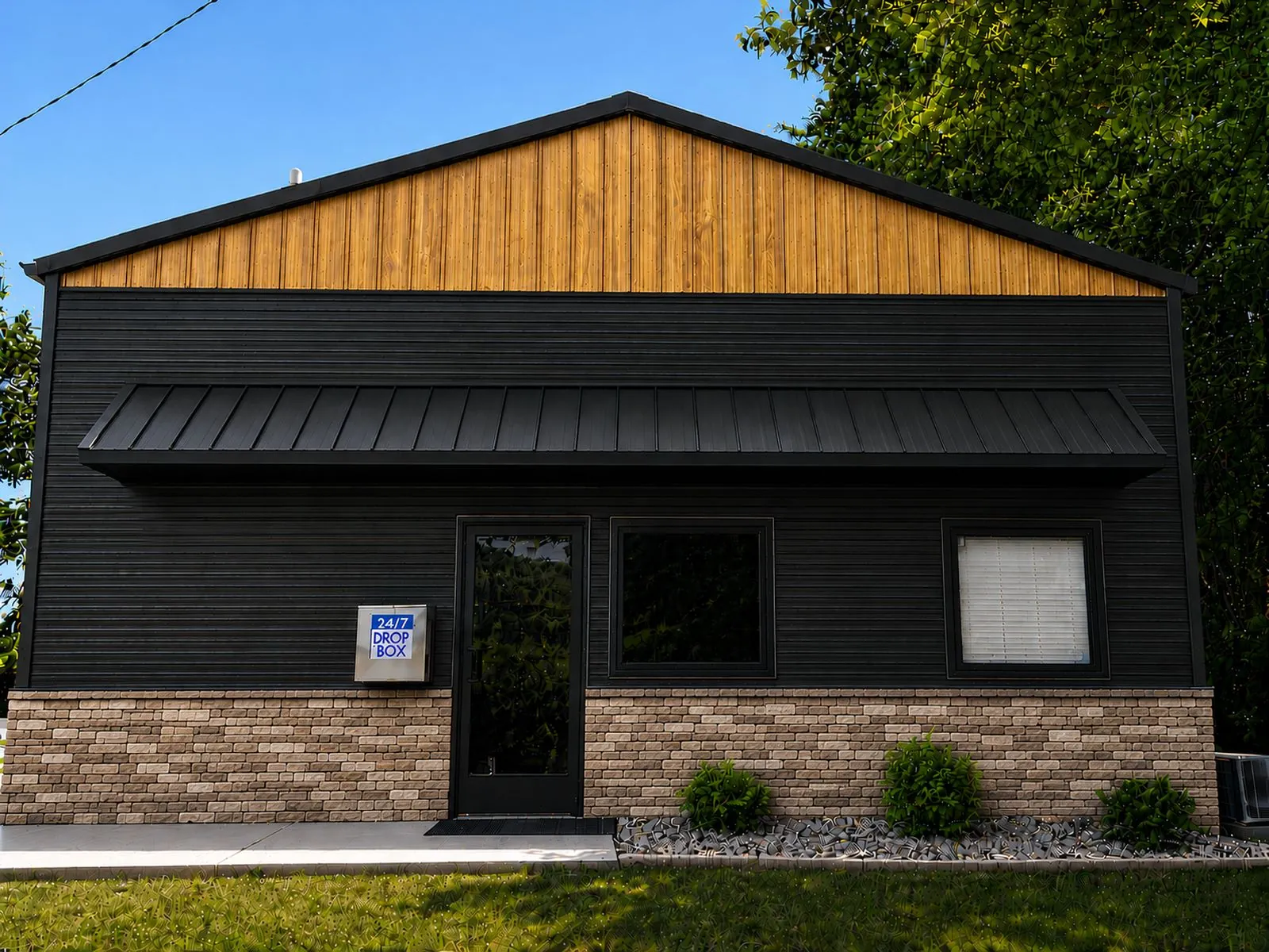 Design rendering of a shop front in black siding with a cedar gable